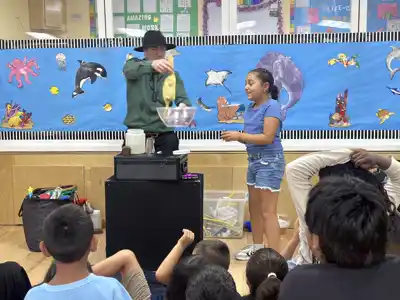 Children enjoying fun-filled summer activities and water play programs year-round at Sierra Preschool