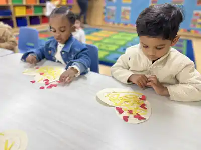 Toddlers at Sierra Preschool ages 18-30 months engaged in creative play-based learning exploration